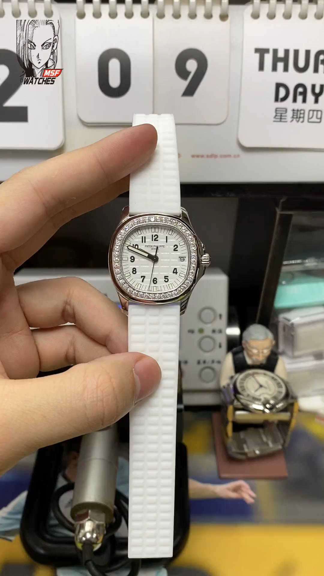 Patek Philippe Aquanaut series 5069G-011, White Dial with Diamond Bezel, Women 35.2mm Size.