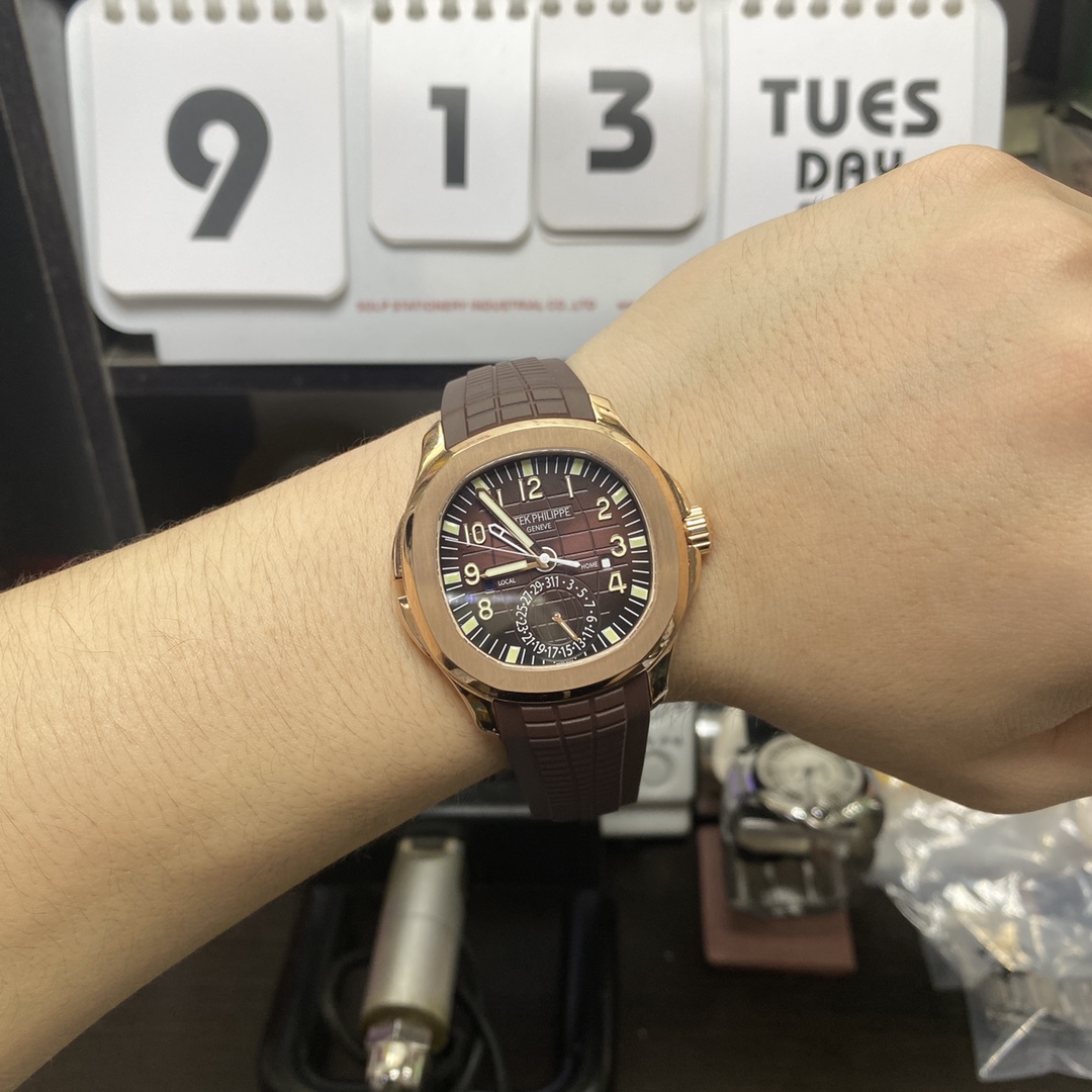 Patek Philippe Aquanaut Travel Time series 5164R-001, brown dial, GMT Dual Time Function, 40.8mm size.