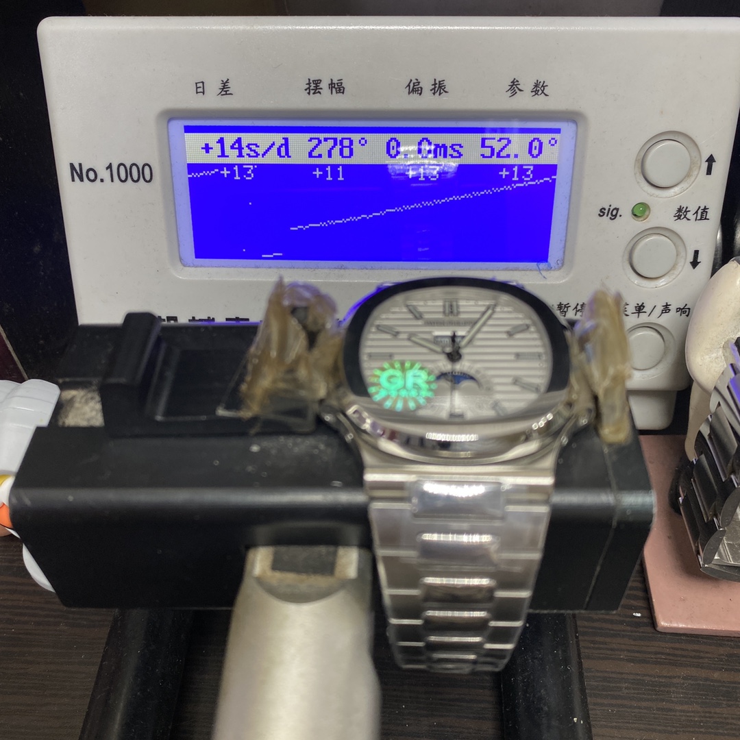 Patek Philippe Nautilus series 57261A-010, White Dial, Complete Month Day Date and Moon Phase Functions, 40.5mm Size.