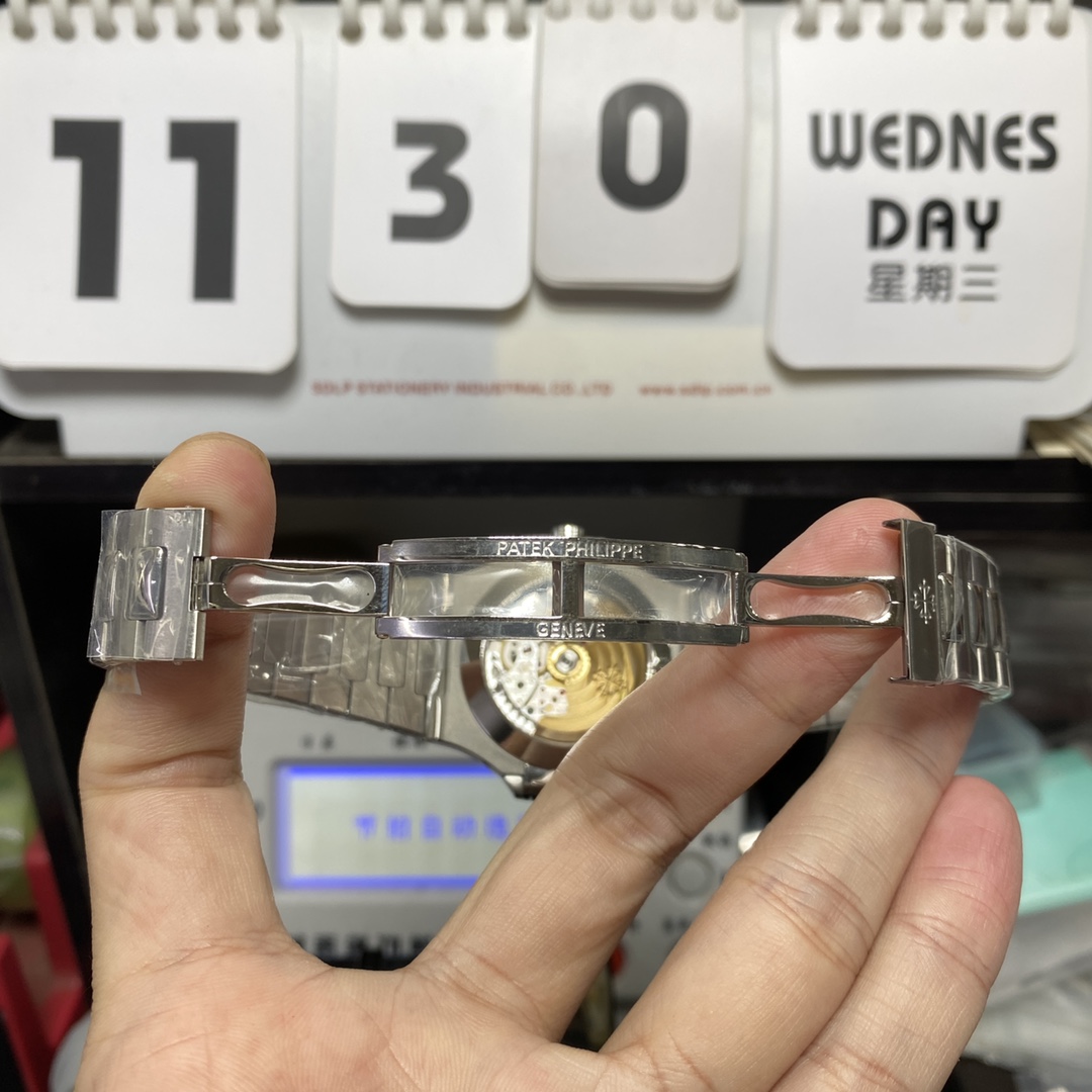 Patek Philippe Nautilus series 57261A-010, White Dial, Complete Month Day Date and Moon Phase Functions, 40.5mm Size.