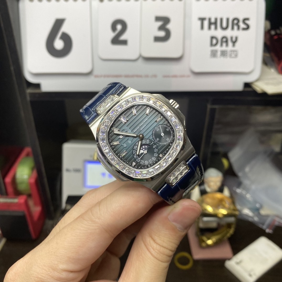 Patek Philippe Nautilus series 5724G-001, Square Diamond Bezel Blue Dial Blue Leather Strap, 40mm size.