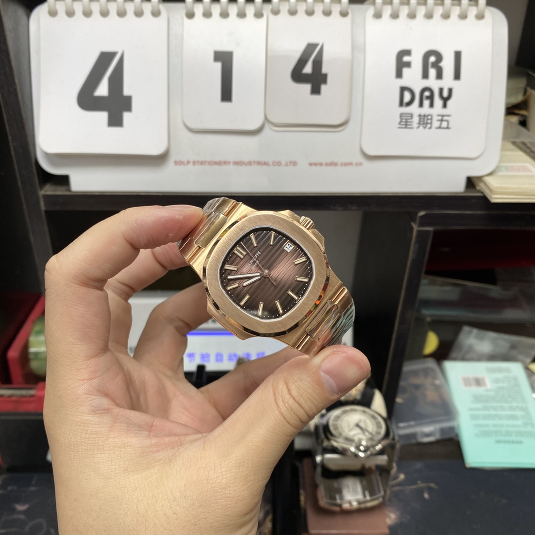 Patek Philippe Nautilus series 57111R-001, Coffee Dial Rose Gold Case Steel Bracelet, 40mm size.