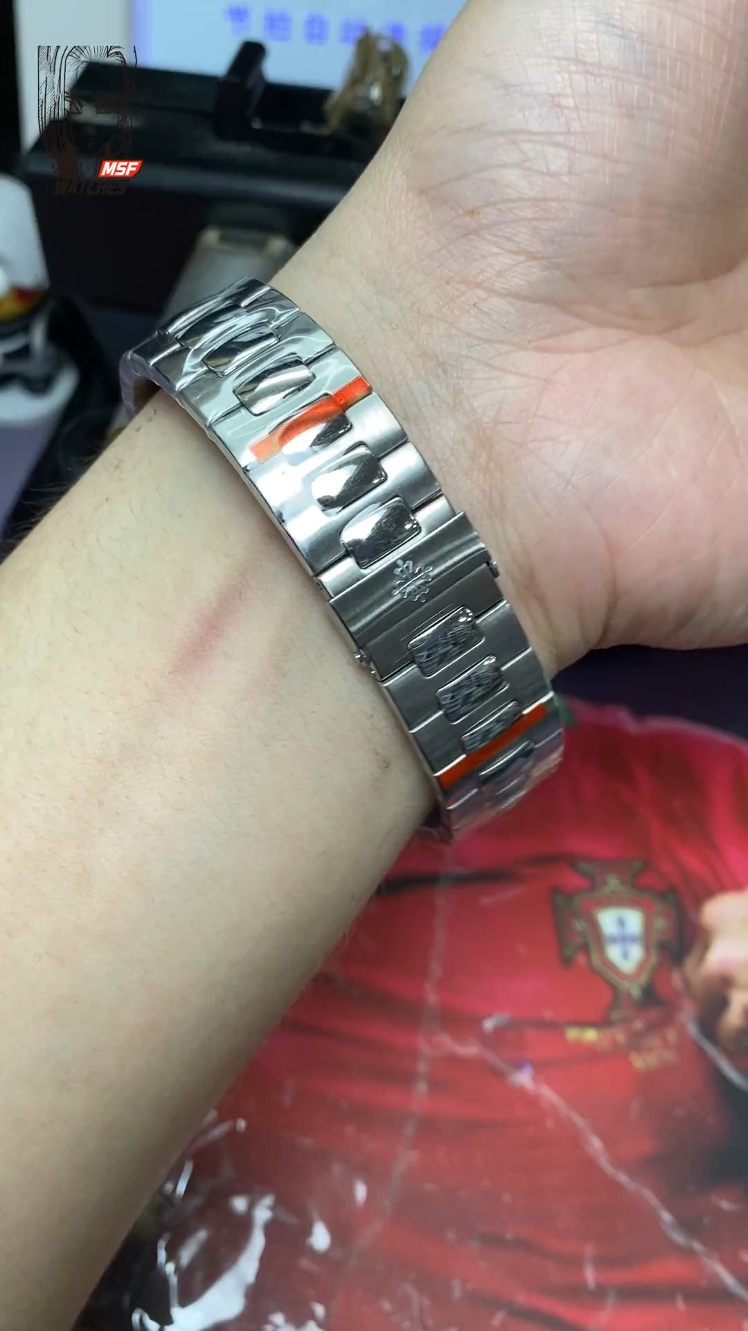 Patek Philippe Nautilus series 57121A-001, Blue Dial Steel Bracelet, Synchronized Functions, 40mm size.