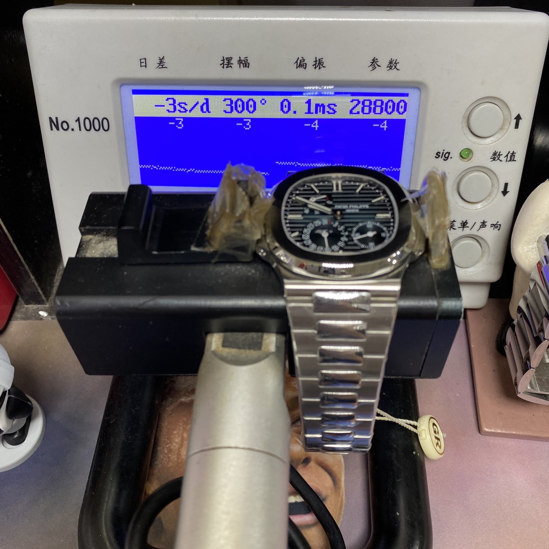 Patek Philippe Nautilus series 57121A-001, Blue Dial Steel Bracelet, Synchronized Functions, 40mm size.