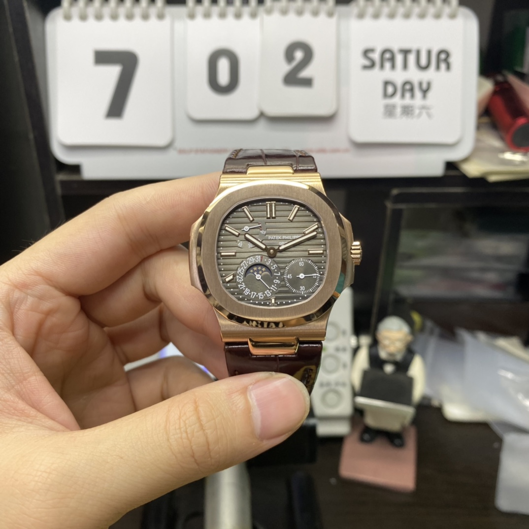 Patek Philippe Nautilus series 5712GR-001, Coffee Dial Rose Gold Case Brown Leather Strap, 40mm size.