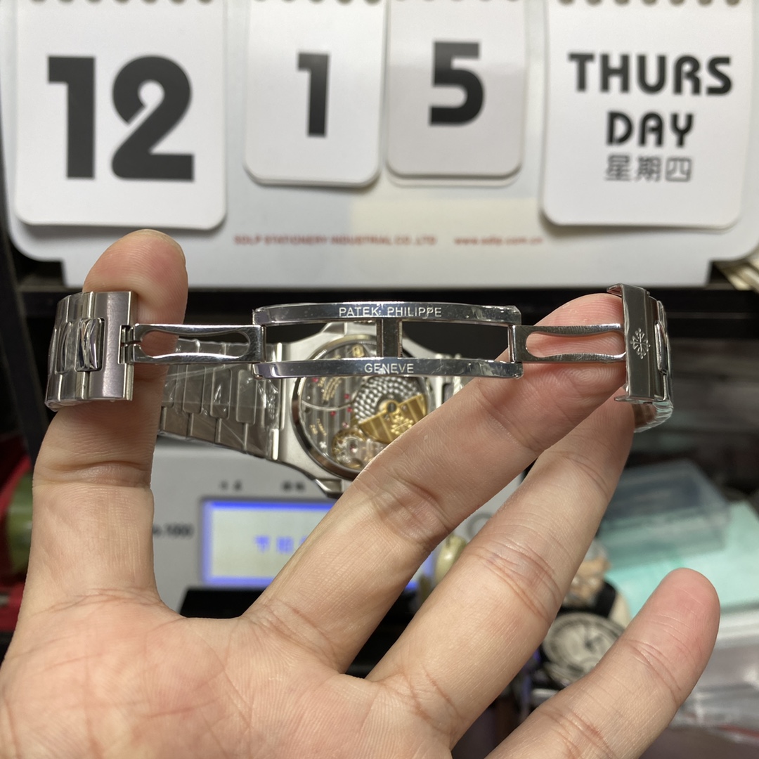 Patek Philippe Nautilus series 57121A-001, Blue Dial Steel Bracelet, Synchronized Functions, 40mm size.