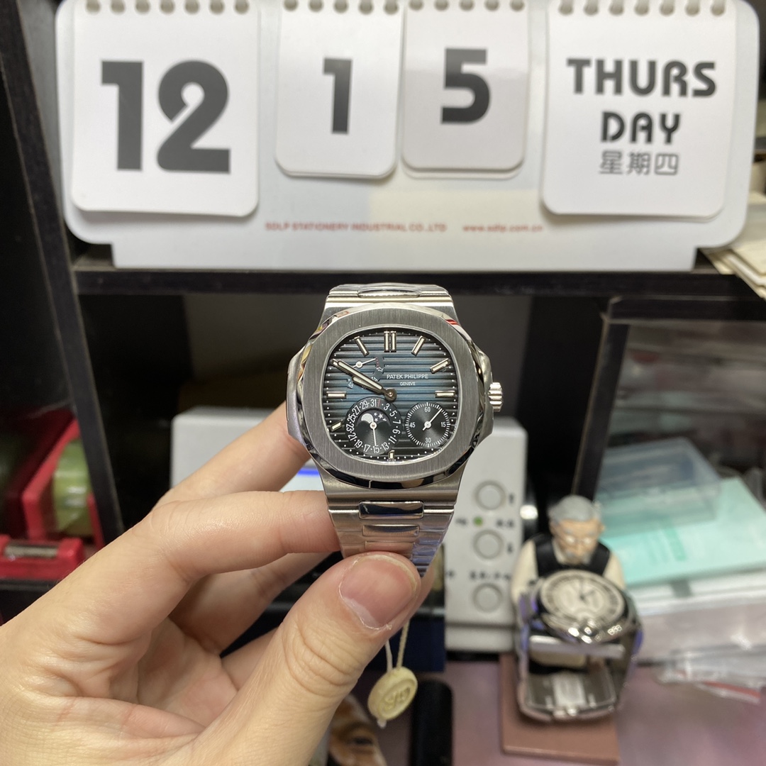 Patek Philippe Nautilus series 57121A-001, Blue Dial Steel Bracelet, Synchronized Functions, 40mm size.