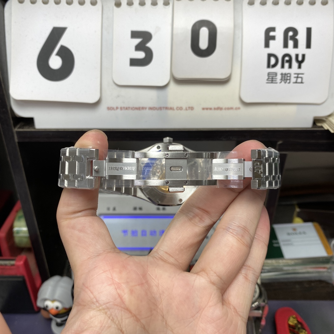 Audemars Piguet Royal Oak Series 15400ST, ICE Blue Dial, diamond brezel, 41mm size.