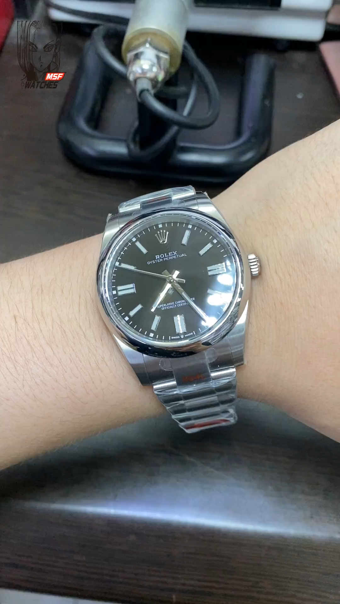 Rolex Oyster Perpetual series m124300-0002, Black Dial with Stick Indexes, 41mm size.