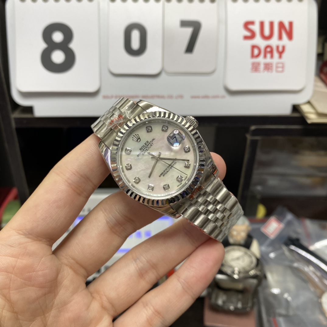 Rolex Datejust Series m126234-0019, White Mother-of-Pearl Dial with Diamond Hour Markers, 36mm size, Jubilee stainless steel bracelet.