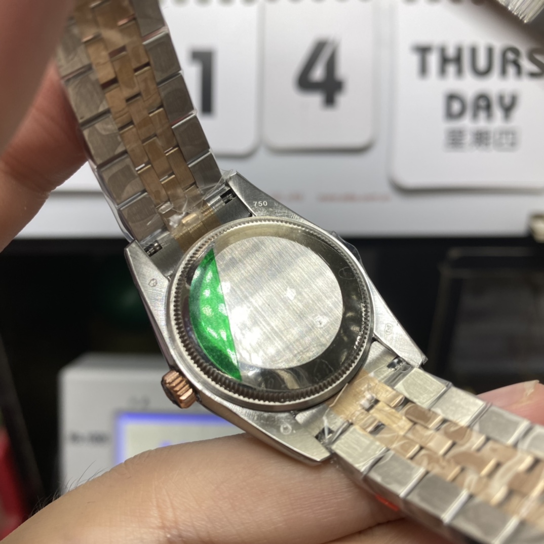 Rolex Datejust series m278383rbr-0030, Two-Tone Gold Case with Green Dial and Diamond Bezel, 31mm size, Jubilee bracelet.