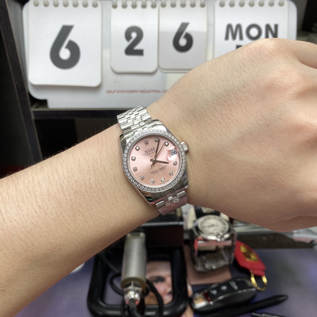 Rolex Datejust series m278384rbr-0036, Pink Dial with Diamond Bezel, 31mm size, Jubilee stainless steel bracelet.