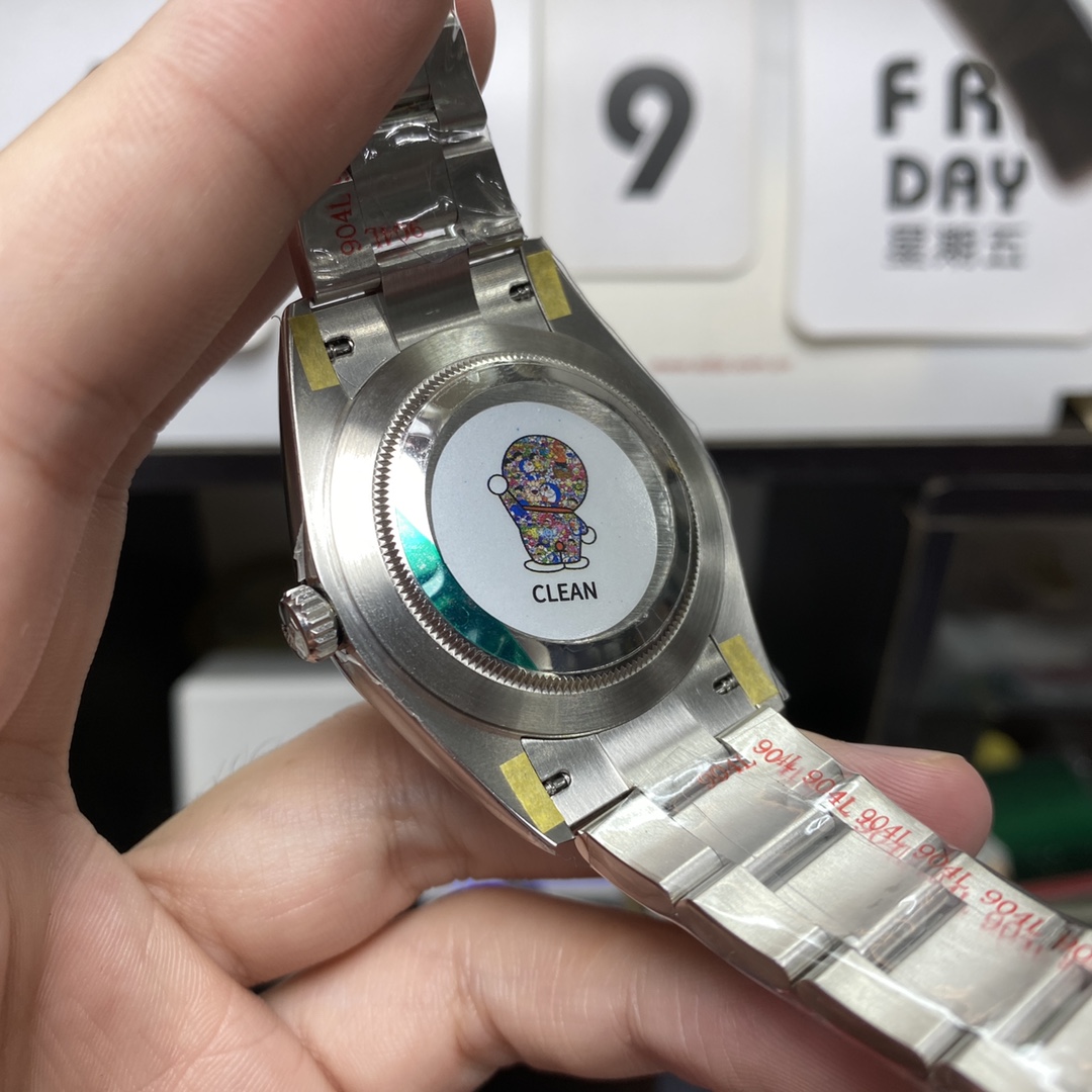 Rolex Datejust series m126334-0021, Grey Dial Green Roman Numerals, 41mm size. Oyster strap