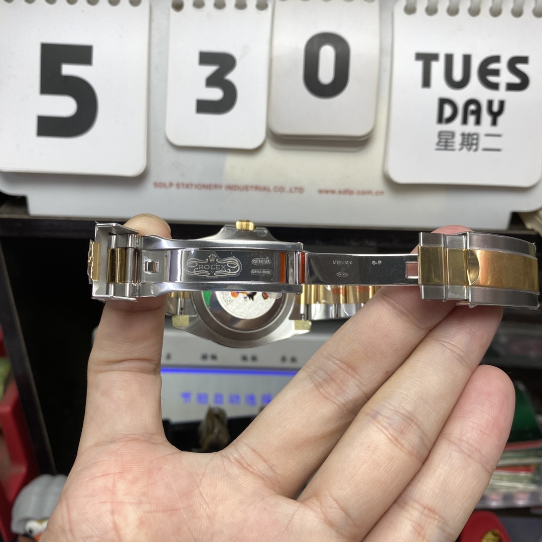 Rolex Submariner Series 116613LN-0001, Two-Tone Black Submariner, 40mm size.