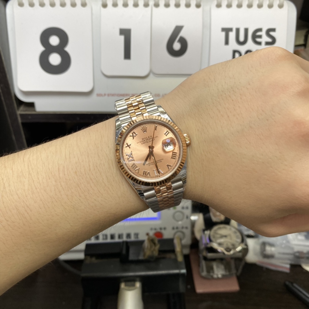 Rolex Datejust Series m126231-0027, Rose Red Dial Everose Gold Case Roman Numerals Five-Piece Link Jubilee Bracelet, 36mm Size.