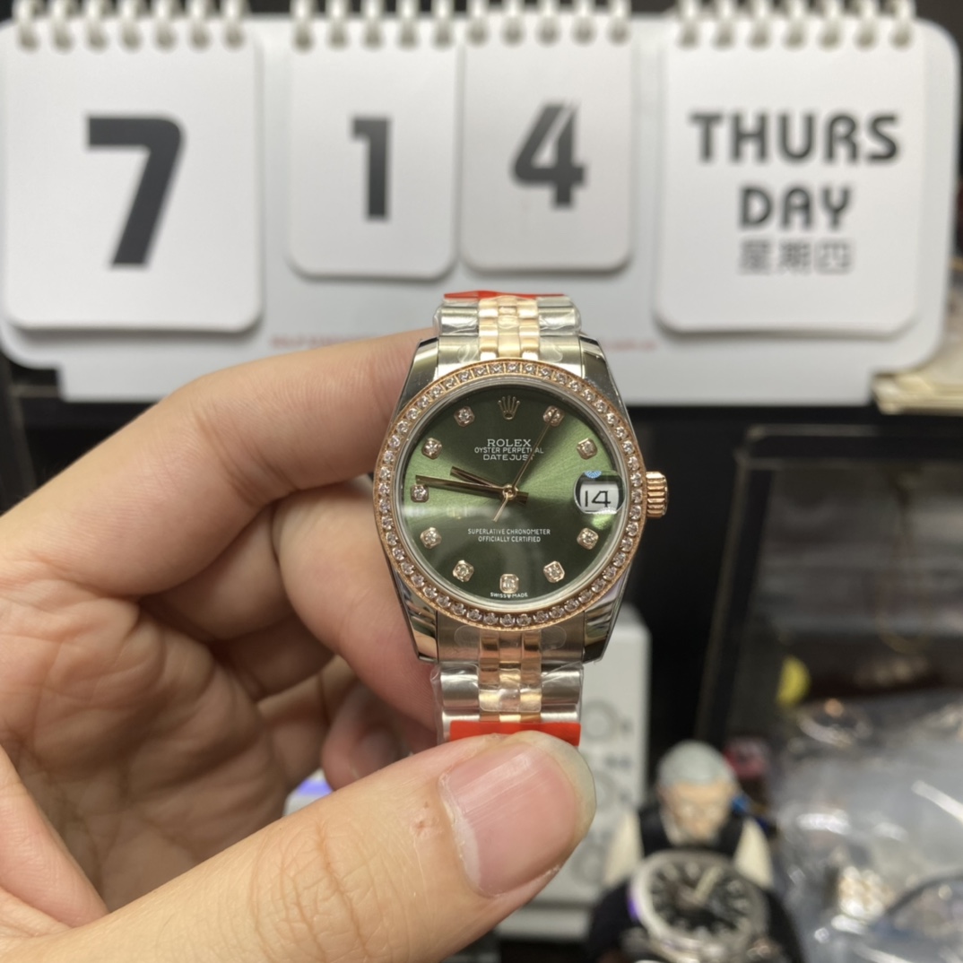 Rolex Datejust series m278383rbr-0030, Two-Tone Gold Case with Green Dial and Diamond Bezel, 31mm size, Jubilee bracelet.