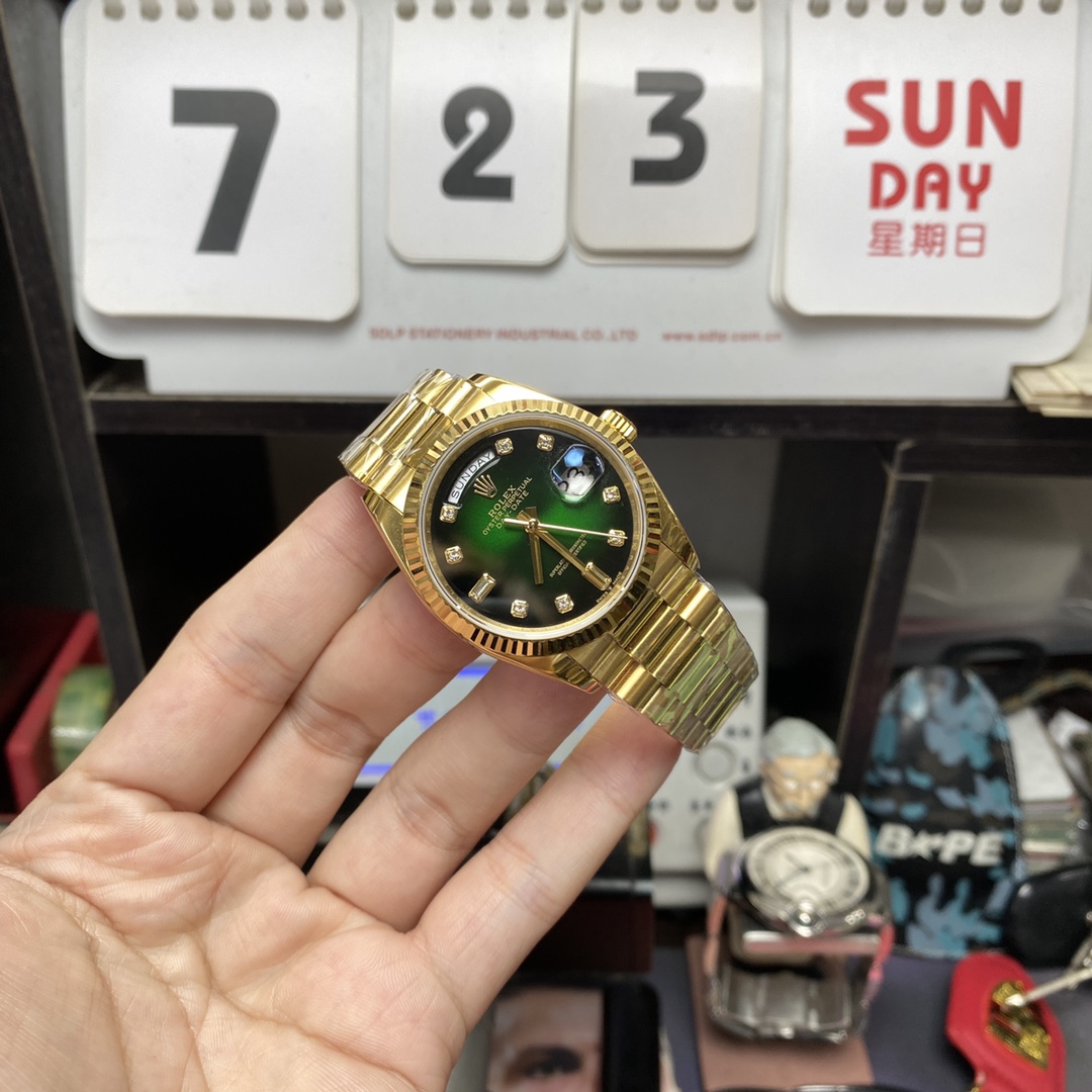 Rolex Day-Date series m128238-0069, Full Gold with Green Dial Diamond Hour Markers, 36mm Size.