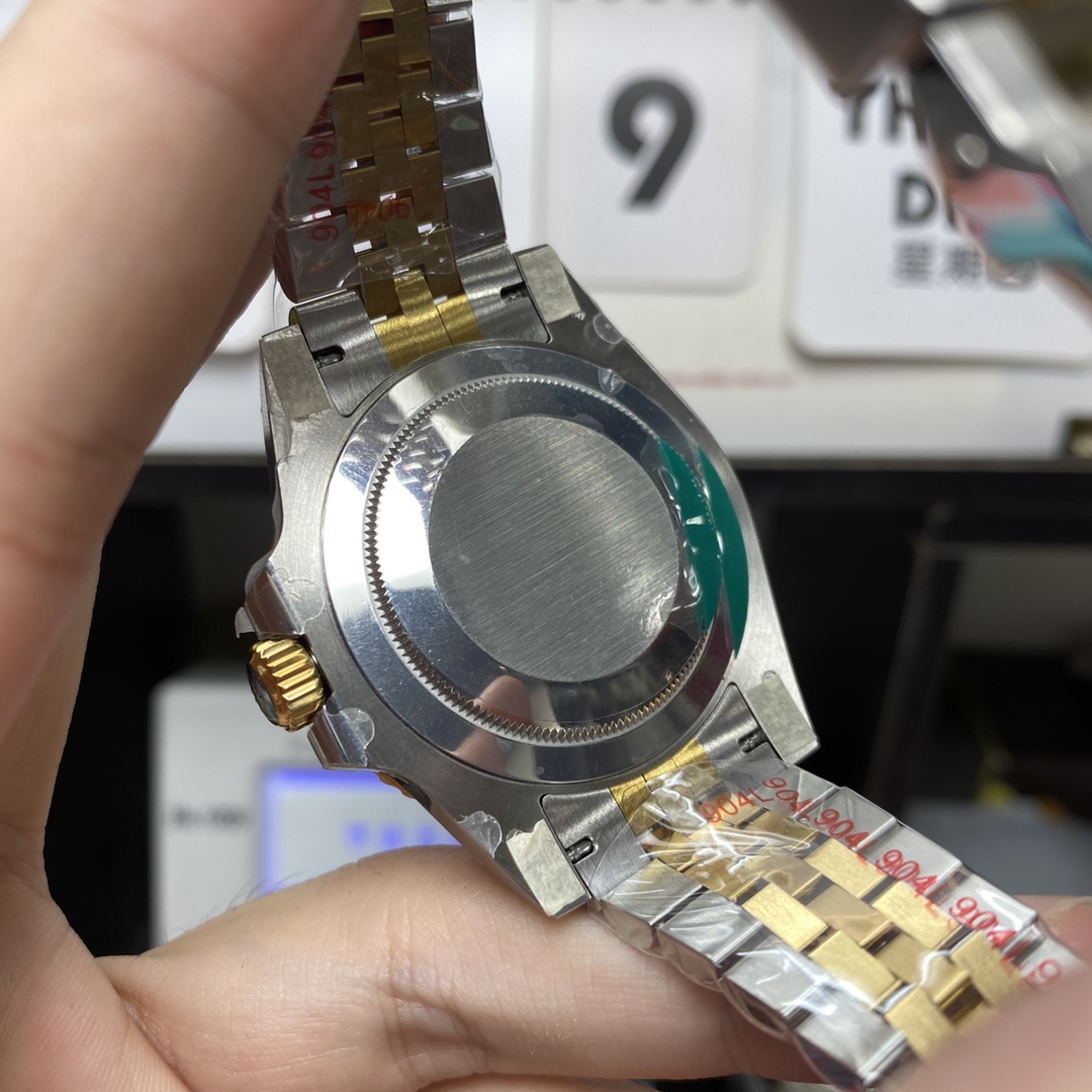 Rolex GMT-Master II series m126713grnr-0001, InterGold Black/Grey Ceramic Bezel InterGold Five-Bead Chain Steel Bracelet, 40mm size.