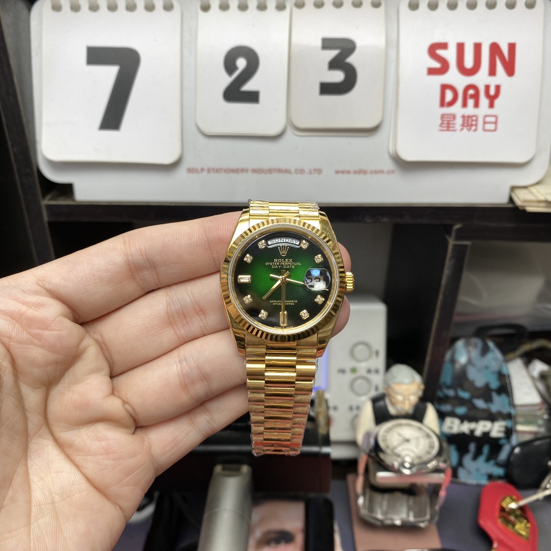 Rolex Day-Date series m128238-0069, Full Gold with Green Dial Diamond Hour Markers, 36mm Size.