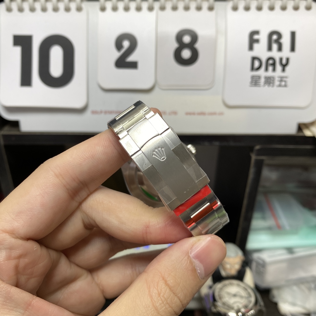 Rolex Oyster Perpetual series m124300-0002, Black Dial with Stick Indexes, 41mm size.