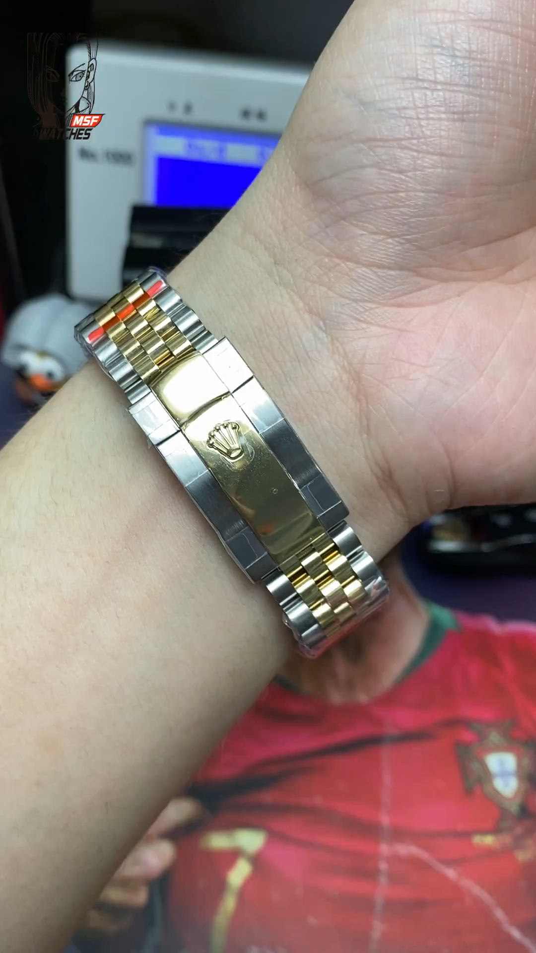 Rolex Datejust series m126333-0006, two-tone gold case black dial with diamond markers and a five-link two-tone gold bracelet, 41mm size.